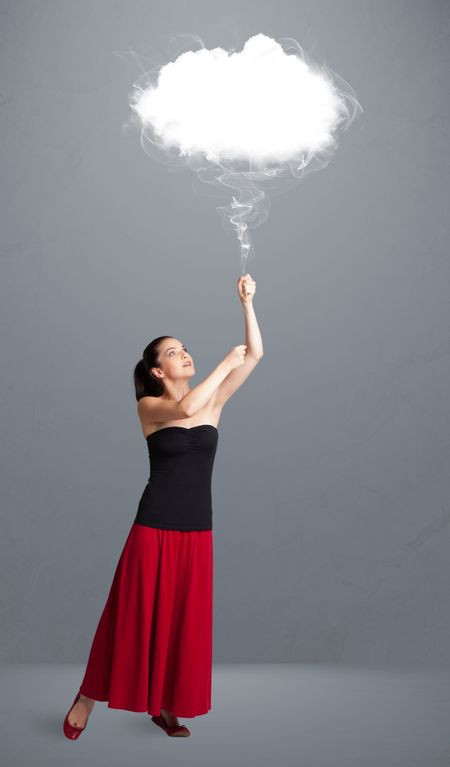 Beautiful young woman holding cloud