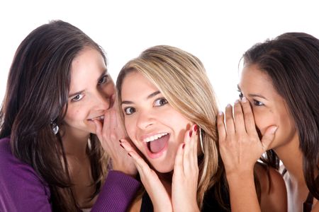 Group of girls gossiping isolated over a white background