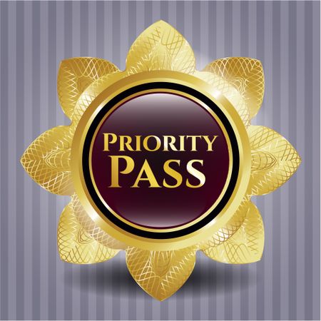 Priority pass gold emblem.