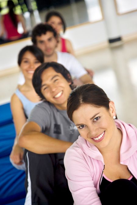 Group of people at the gym smiling