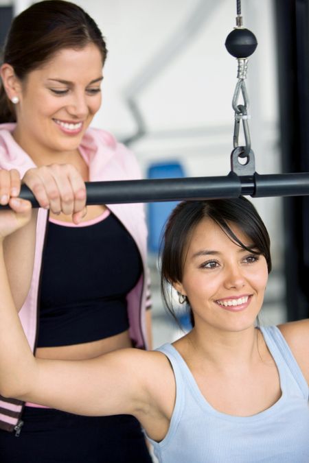 Beautiful girls working out at the gym