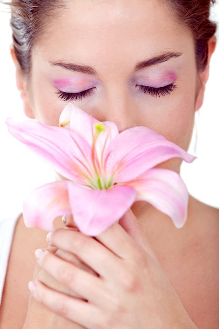 Beatiful woman face with a gorgeous flower