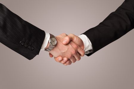 Business handshake on gradient background