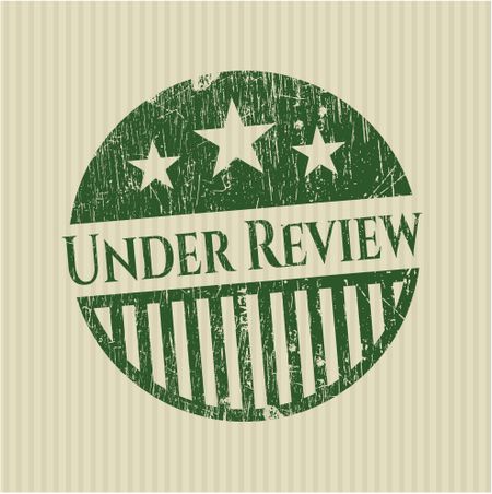 Under review green rubber stamp