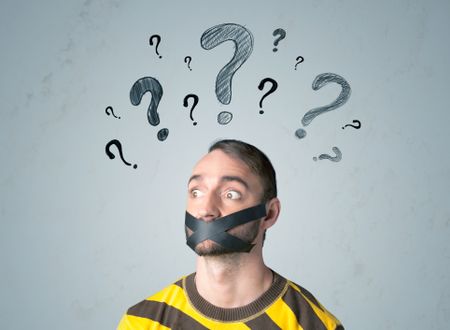 Young man with taped mouth and question mark symbols around his head     