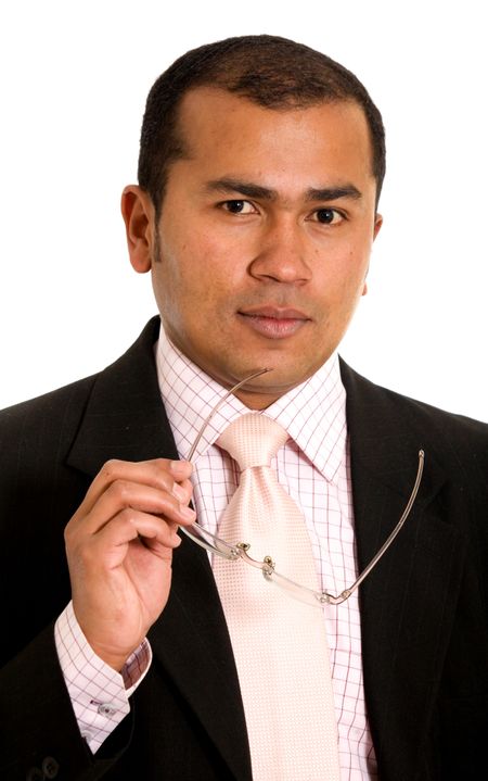 Latin American business man portrait with a pair of glasses on his hand