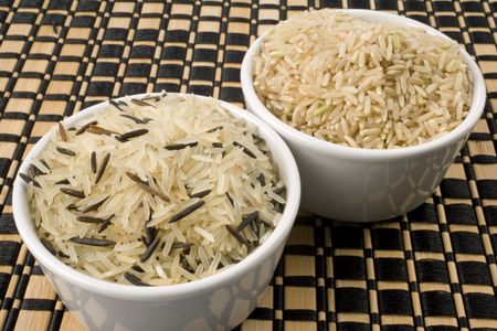 Basmati, whole grain and wild rice in bowls