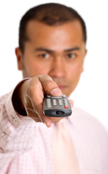 Business man with a remote control over a white background