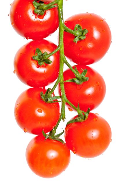 bunch of cherry tomatoes isolated over white