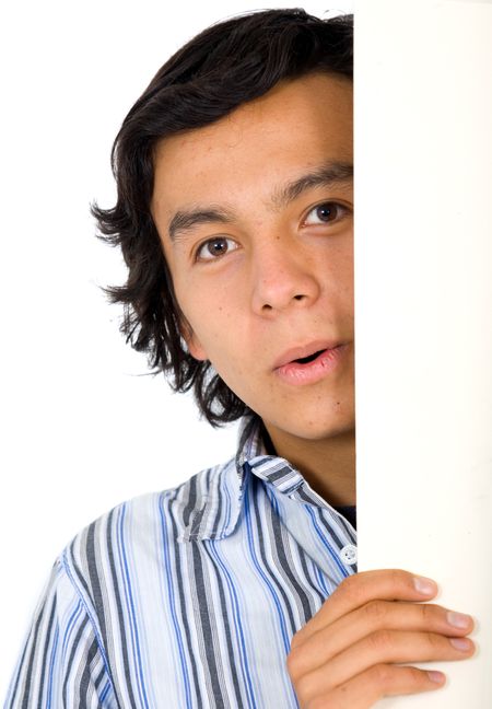 curious guy peeking behind a white board - isolated