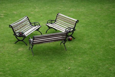 three benches in a park