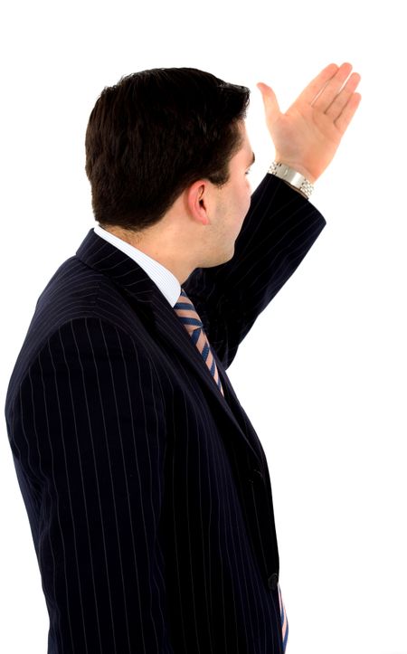 business man pointing at something as if he was presenting - isolated over a white background