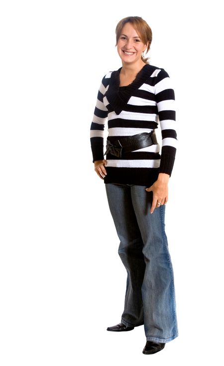 casual girl smiling while standing isolated over a white background