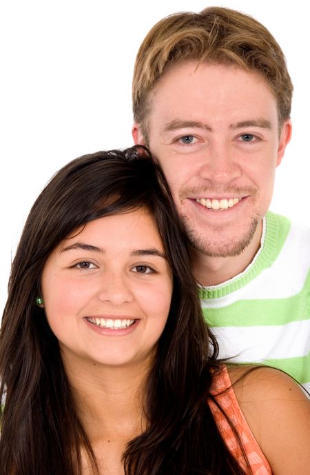 young couple smiling next to each other - isolated over a white background