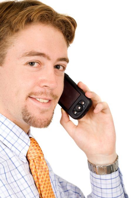 business man talking on his pda or palmtop computer isolated over a white background