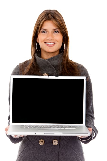 Business woman displaying a laptop isolated over white