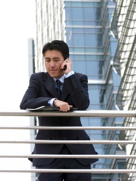 business man on the phone in a corporate environment
