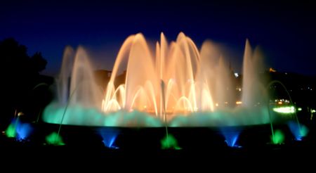 magic fountain in barcelona by the montjuic at night