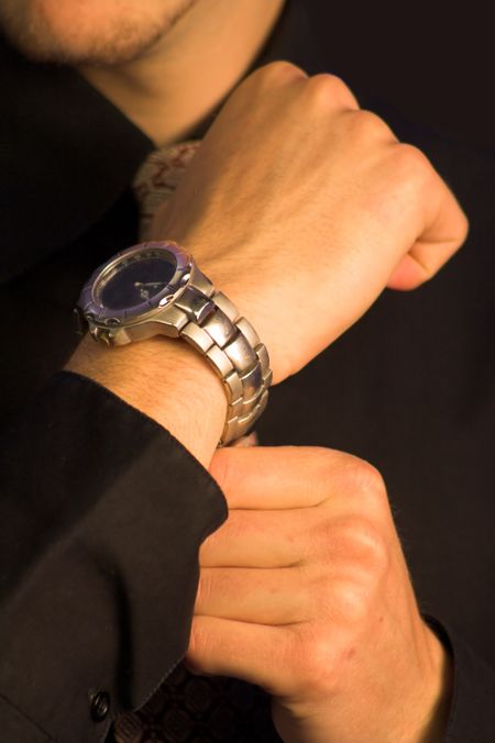 business man wearing a nice silver watch