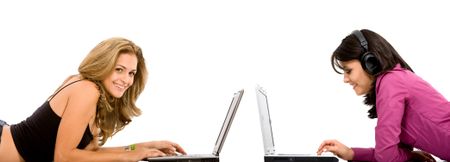 Women with laptop computers over a white background