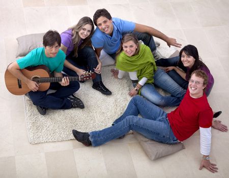 Group of people gathering and playing music