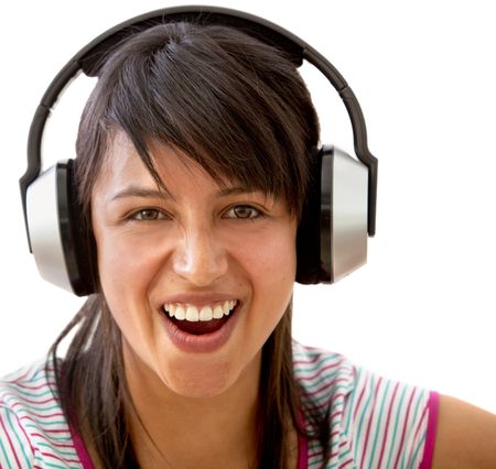 Happy girl with big earphones isolated over white
