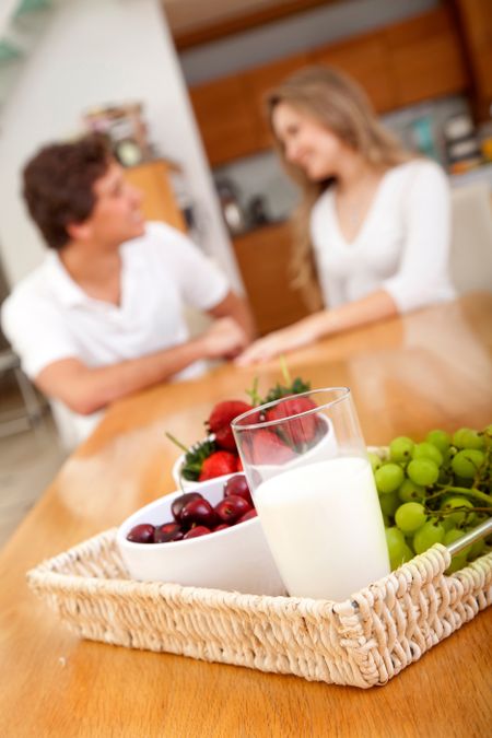 Couple at home with a healhty breakfast