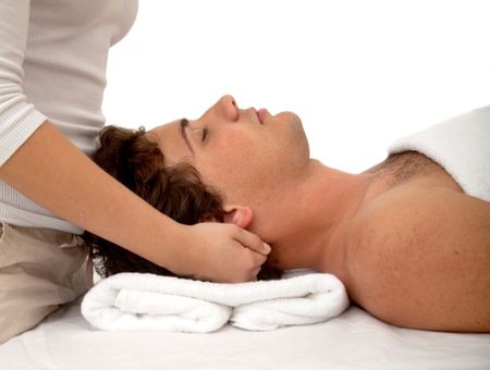 Relaxed man getting a stress free massage isolated