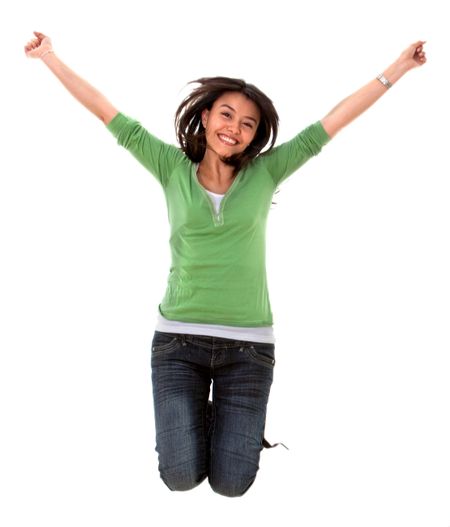 Happy casual woman jumping isolated over white
