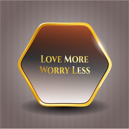 Love More Worry Less gold emblem or badge