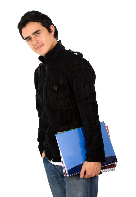 male young student carrying books in his arms - isolated over a white background