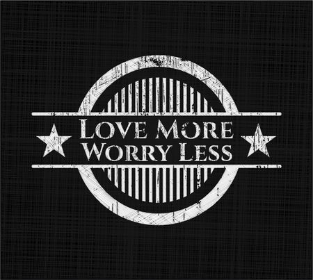 Love More Worry Less written on a blackboard