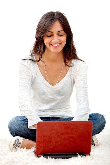 Beautiful casual woman with a laptop isolated
