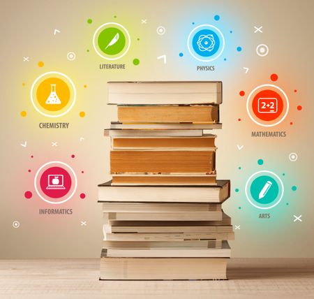 Books on top with colorful symbols on vintage old background