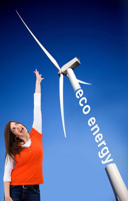 Woman with a windmill over a blue sky generating eco energy