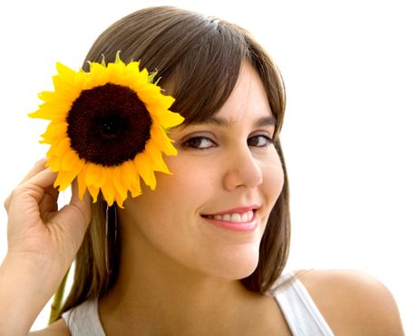 Beautiful woman with a sunflower on her head isolated