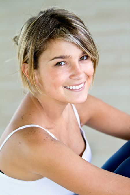 beautiful woman portrat at the gym smiling