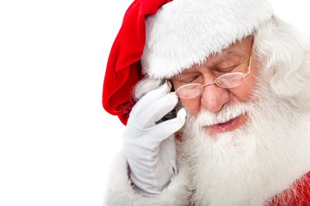 Santa talking on the phone isolated over a white background