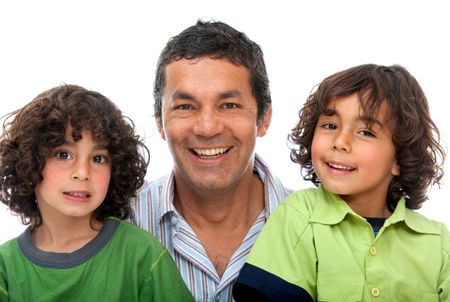 Father and sons smiling isolated over a white background