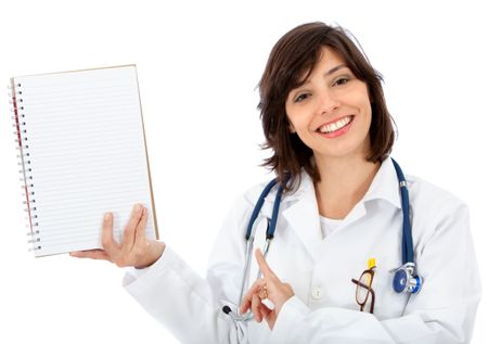 Female doctor pointing at a notebook isolated over a white background