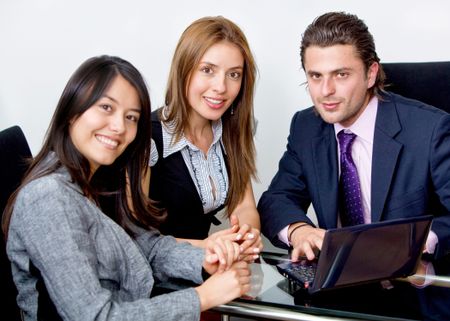 Group of young executives working at the office