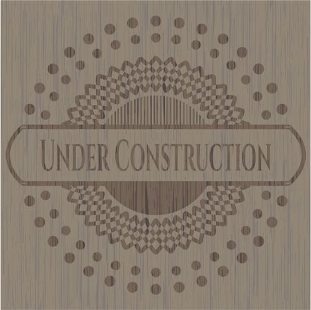 Under Construction wooden emblem
