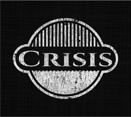Crisis chalk emblem written on a blackboard