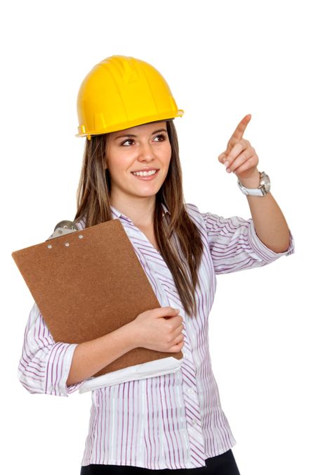 Female engineer pointing at something isolated over a white background