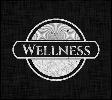 Wellness chalkboard emblem on black board