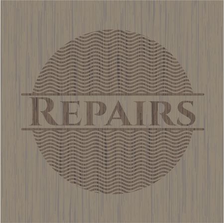Repairs vintage wooden emblem
