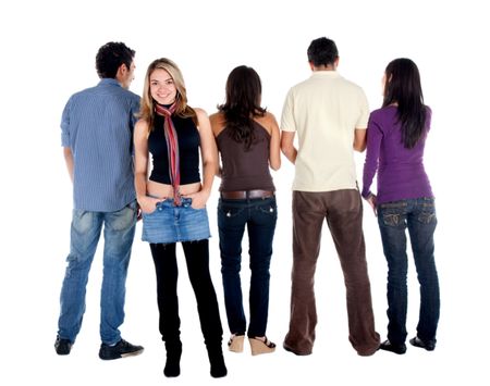 Rear view of a casual group of people with a girl facing the camera - isolated