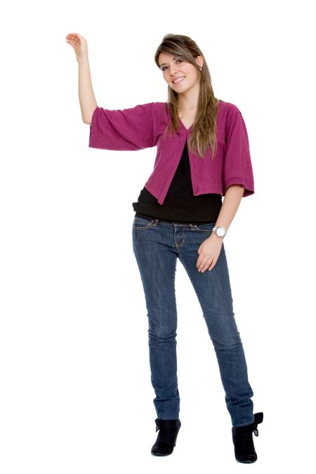 casual girl with hand on something imaginary - isolated over a white background