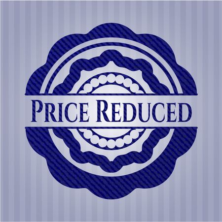 Price Reduced badge with denim background