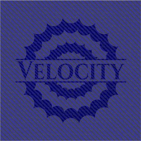Velocity emblem with jean background